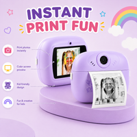 Girl holding Kids Instant Print Camera - Capture and Print Memories